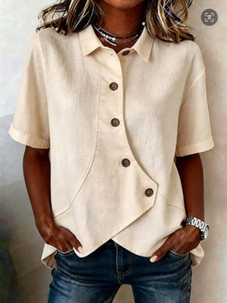 Céline | Blouse chic à boutons à effet statement