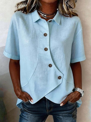 Céline | Blouse chic à boutons à effet statement